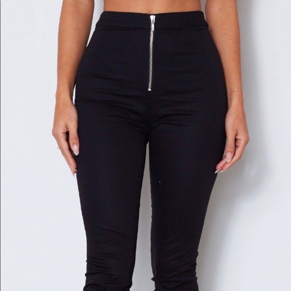 Black skinny slacks with zipper